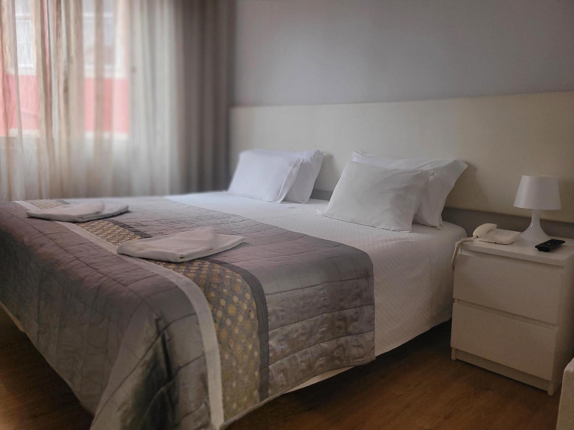 Hotel Residencial Valentina Lizbona Zewnętrze zdjęcie A bedroom in a hotel